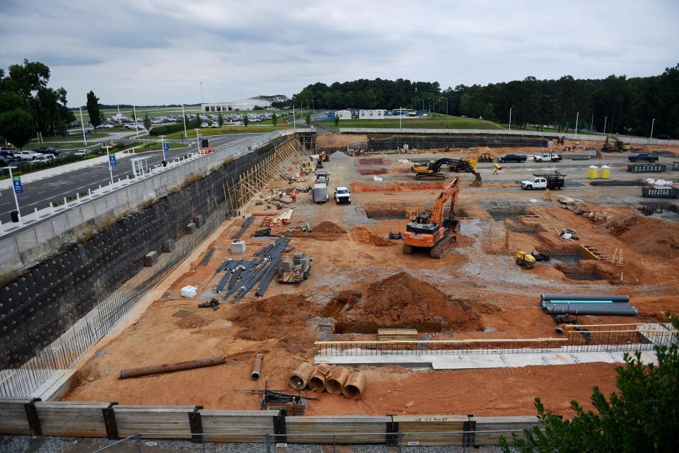 A new parking garage is under construction at Greenville-Spartanburg International Airport on Tuesday, June 18, 2024. The new garage will house an additional 1,500 parking spaces and a rental car facility.