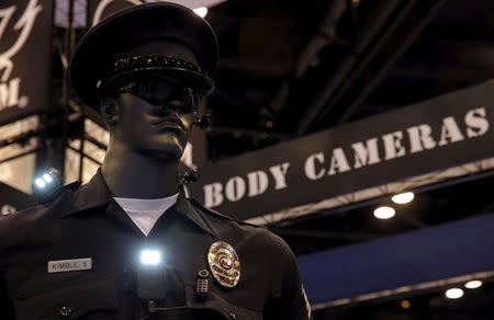 Police body cameras are seen on a mannequin at an exhibit booth by manufacturer Wolfcom at the International Association of Chiefs of Police conference in Chicago, Illinois, October 26, 2015. REUTERS/Jim Young