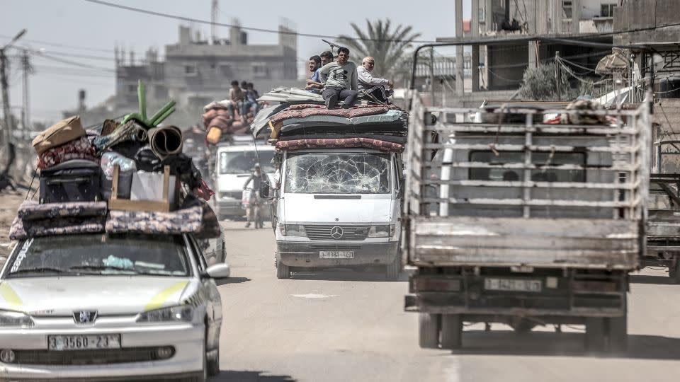 Palestinians forced to evacuate eastern Rafah, on May 8, carry their belongings as Israeli forces intensified attacks on the city, in southern Gaza. - Ali Jadallah/Anadolu/Getty Images