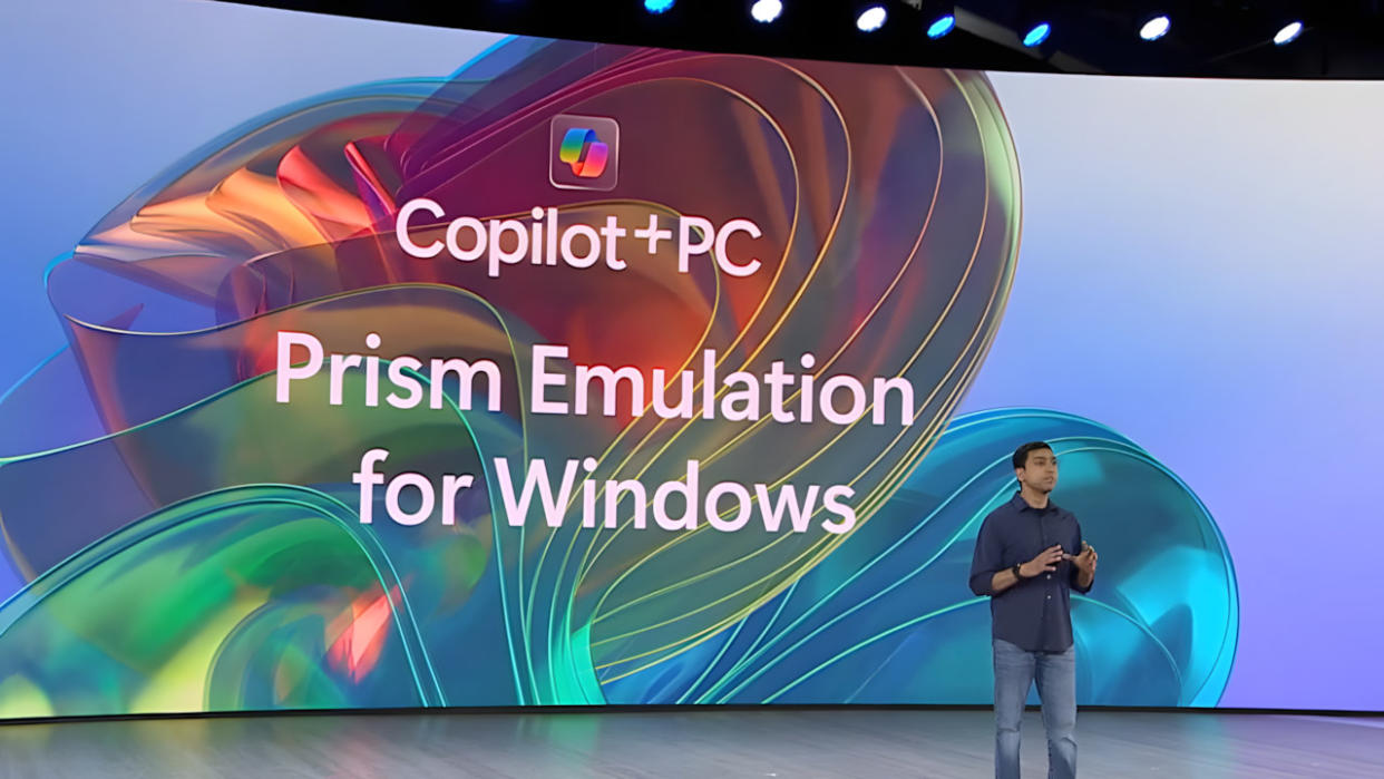  Pavan Davuluri speaking on stage about Prism emulation for Windows. 