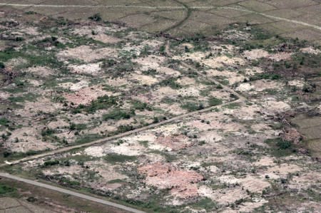 An aerial view shows burned down villages once inhabited by the Rohingya seen from the Myanmar military helicopters that carried the U.N. envoys to northern Rakhine state, Myanmar