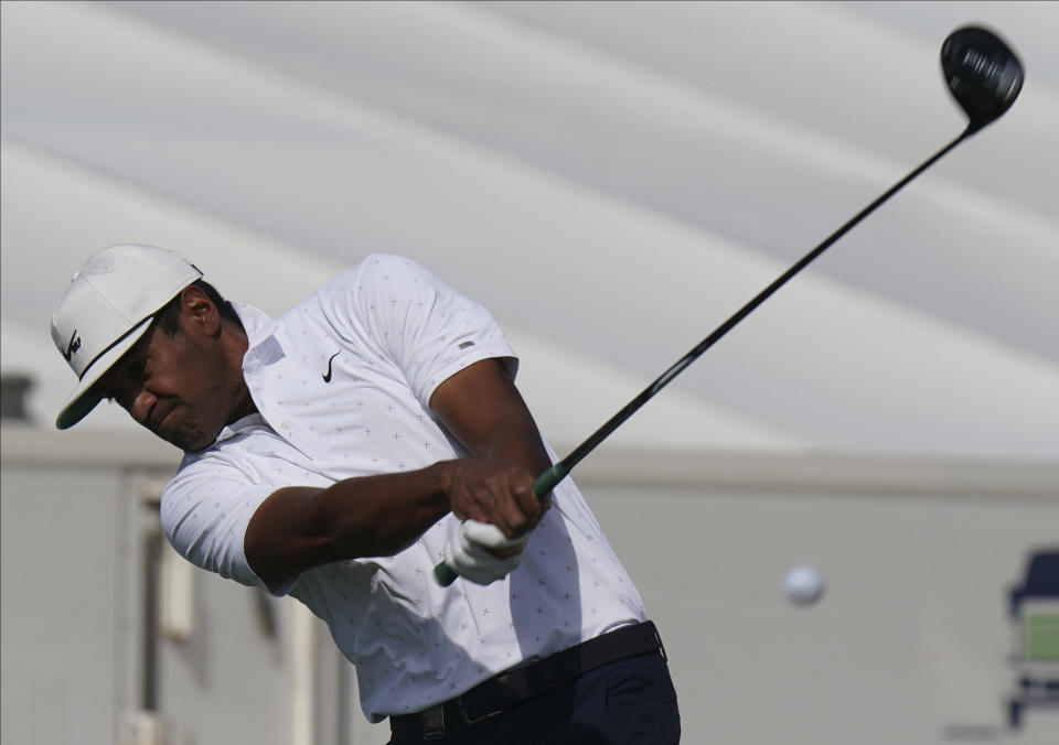 Tony Finau, of the United States, swings his club on the fourth tee during the second round of the Hero World Challenge PGA Tour at the Albany Golf Club, in New Providence, Bahamas, Friday, Dec. 3, 2021.(AP Photo/Fernando Llano)