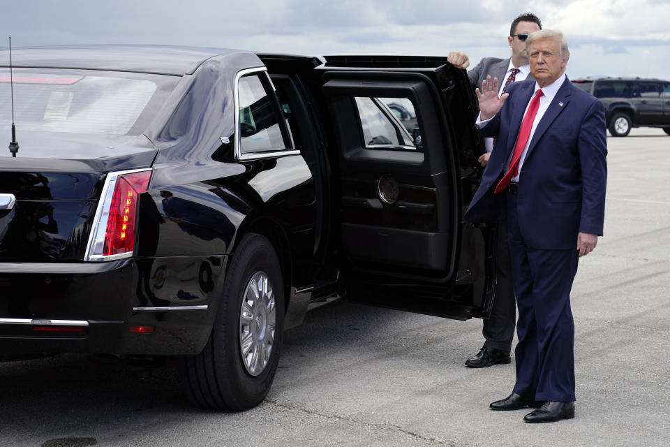 President Donald Trump waves as he arrives at West Palm Beach International Airport, Tuesday, Sept. 8, 2020, in West Palm Beach, Fla. (AP Photo/Evan Vucci)