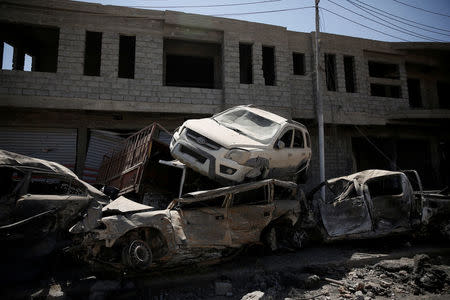 Destroyed cars are piled up in western Mosul, Iraq May 27, 2017. REUTERS/Alkis Konstantinidis