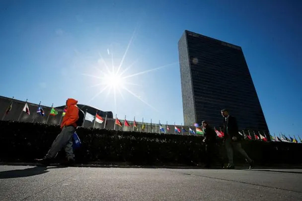 PHOTO: People walk in front of United Nations Headquarters in New York, March 29, 2023. (Eduardo Munoz/Reuters)
