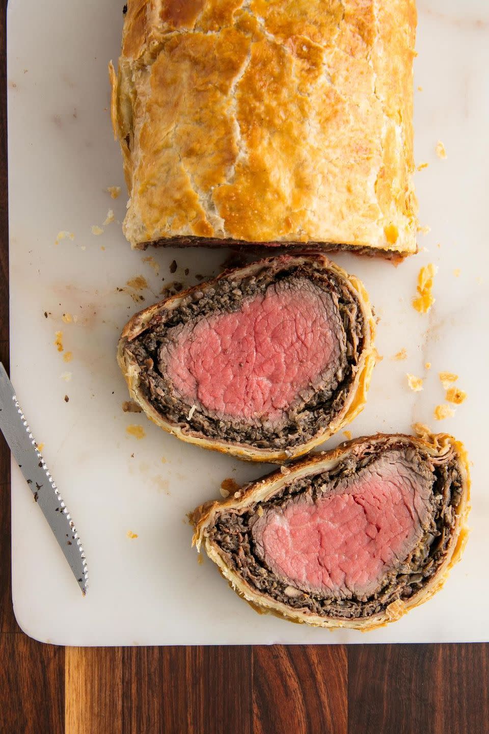 <p>Congratulations! You are about to make your dinner guests extremely happy. While the origins of this famous dish are unknown, we do know it's a showstopper that is <strong>not</strong> for the faint of heart. </p><p>Get the <a href="https://www.delish.com/uk/cooking/recipes/a30252161/easy-beef-wellington-recipe/" rel="nofollow noopener" target="_blank" data-ylk="slk:Beef Wellington;elm:context_link;itc:0;sec:content-canvas" class="link ">Beef Wellington</a> recipe.</p>