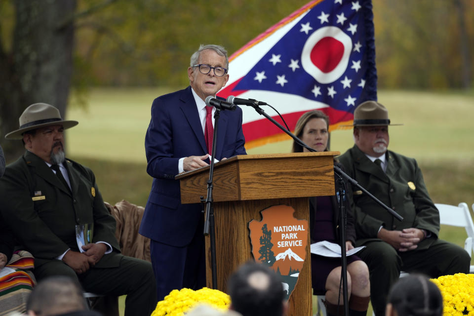 Ohio Gov. Mike DeWine speaks during the Hopewell Ceremonial Earthworks UNESCO World Heritage Inscription Commemoration ceremony, at the Mound City Group at Hopewell Culture National Historical Park in Chillicothe, Ohio, Saturday, Oct. 14, 2023. A network of ancient American Indian ceremonial and burial mounds in Ohio noted for their good condition, distinct style and cultural significance, including Hopewell, was added to the list of UNESCO World Heritage sites. (AP Photo/Carolyn Kaster)