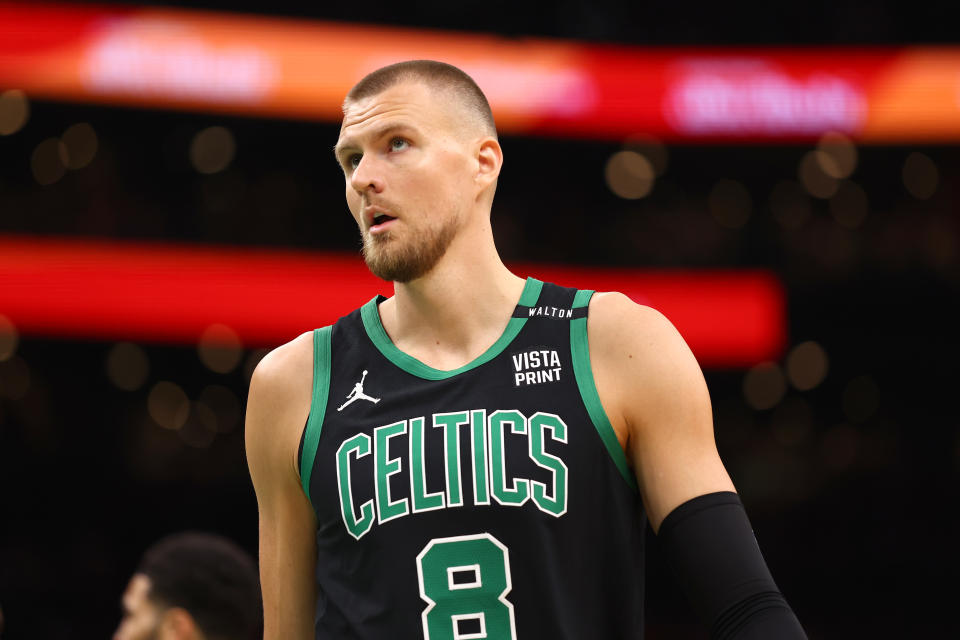 BOSTON, MASSACHUSETTS - JUNE 09: Kristaps Porzingis #8 of the Boston Celtics watches during the first quarter against the Dallas Mavericks in Game Two of the 2024 NBA Finals at TD Garden on June 9, 2024 in Boston, Massachusetts.  NOTE TO USER: User expressly acknowledges and agrees that by downloading and/or using this photo, user agrees to the terms and conditions of the Getty Images License Agreement.  (Photo by Maddie Meyer/Getty Images)