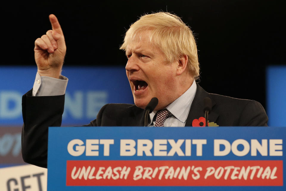 Britain's Prime Minister Boris Johnson speaks at the Conservative Party's General Election campaign launch, at the National Exhibition Centre (NEC) in Birmingham, central England, on November 6, 2019. - British Prime Minister Boris Johnson vowed Wednesday to get Brexit done by January and compared his Labour Party rival Jeremy Corbyn to Joseph Stalin in a strident launch to a tough pre-Christmas election campaign. The splintered country is entering its third general election in four years in search of a solution to a monumental crisis launched by the voters' decision in 2016 to file for a divorce from the European Union after nearly 50 years. (Photo by Adrian DENNIS / AFP) (Photo by ADRIAN DENNIS/AFP via Getty Images)