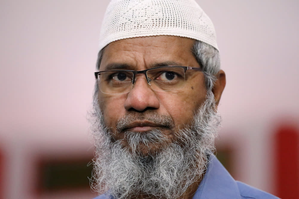 Indian Islamic preacher Dr Zakir Naik reacts during a prayer at a mosque in Melaka September 7, 2019. — Reuters pic