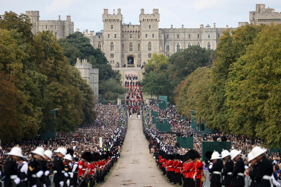 Queen Elizabeth II's funeral procession makes its way down the long walk toward Windsor Castle.