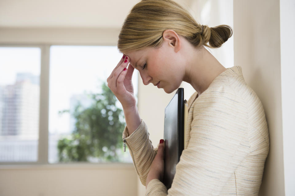 Businesswoman with headache