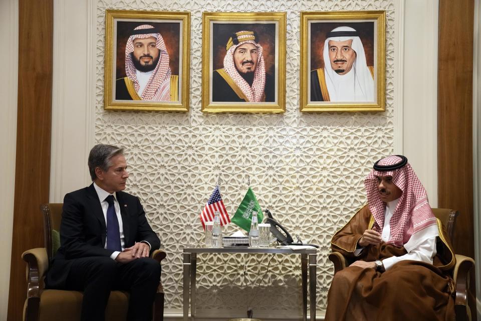U.S. Secretary of State Antony Blinken, left, meets with Saudi Foreign Minister Prince Faisal bin Farhan, at the Ministry of Foreign Affairs in Riyadh, Saudi Arabia, Saturday Oct. 14, 2023. (AP Photo/Jacquelyn Martin, pool)