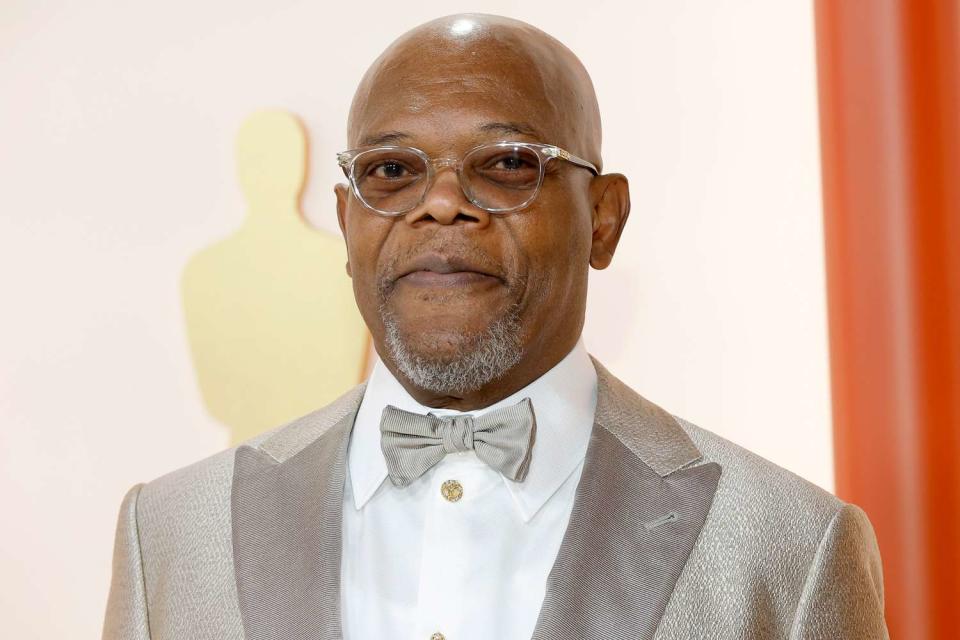 <p>Mike Coppola/Getty</p> Samuel L. Jackson attends the 95th Annual Academy Awards on March 12, 2023