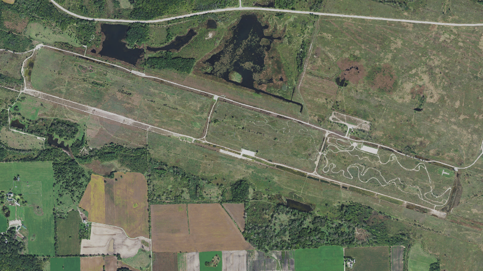 A 2015 aerial image of the never-completed runway at what would have been Bong Air Force Base. The land is now part of Bong Recreation Area.
