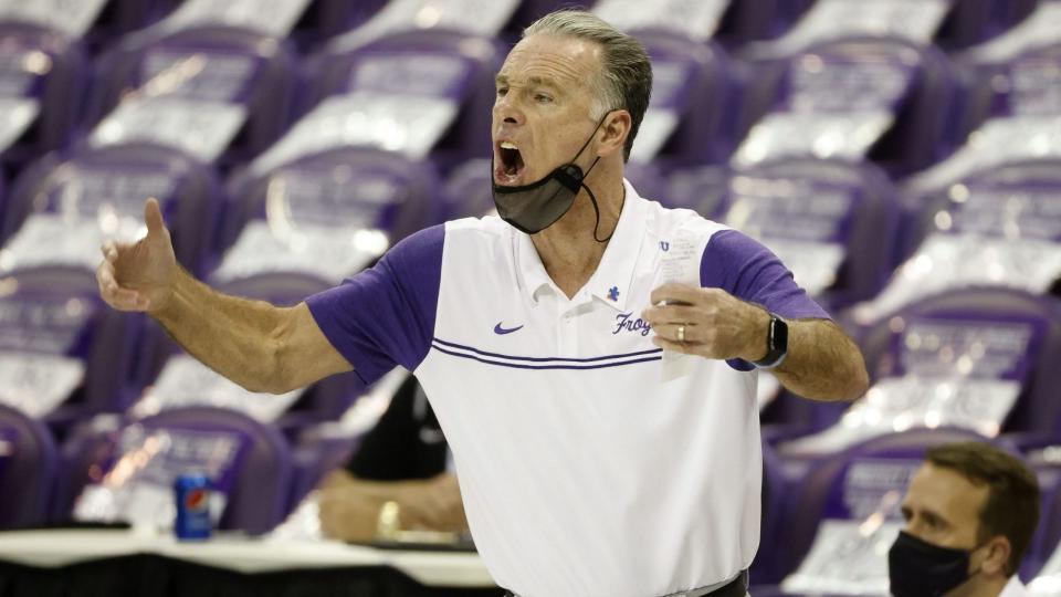 Mandatory Credit: Photo by Michael Ainsworth/AP/Shutterstock (11790011g)Head coach Jamie Dixon directs his team against Texas during the first half of an NCAA college basketball game in Fort Worth, TexasTexas TCU Basketball, Fort Worth, United States - 07 Mar 2021.