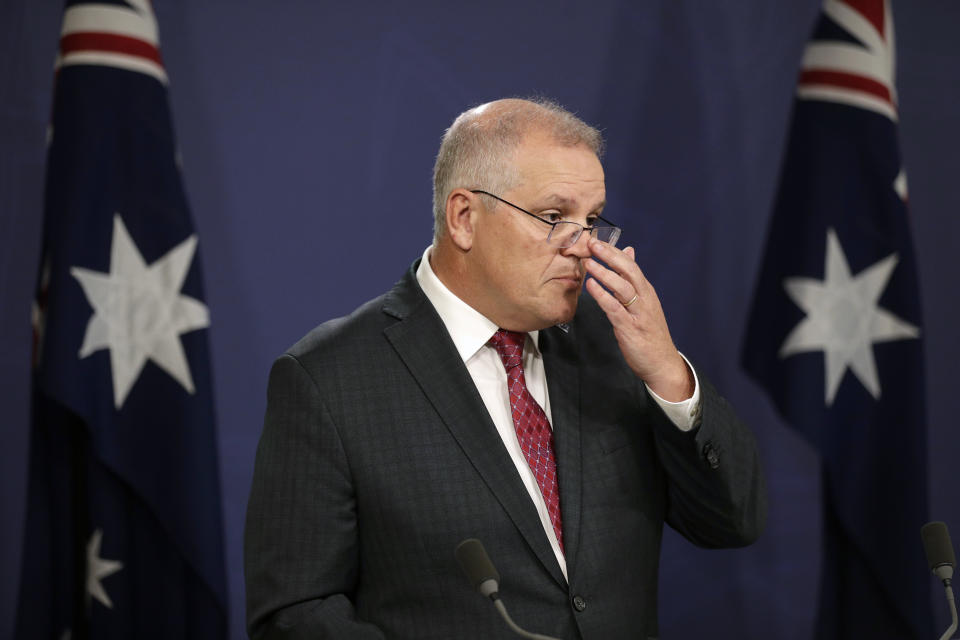 Australia's Prime Minister Scott Morrison attends a press conference in Sydney, Australia, on April 27, 2021. U.S. President Joe Biden, his Chinese counterpart Xi Jinping, Japanese Prime Minister Yoshihide Suga and Russian President Vladimir Putin are among Pacific Rim leaders gathering for a virtual meeting on Friday, July 16, 2021, to discuss strategies to help economies rebound from a resurgent COVID-19 pandemic. (AP Photo/Rick Rycroft)