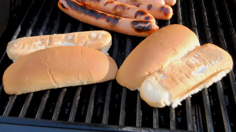 Hot dog buns on grill