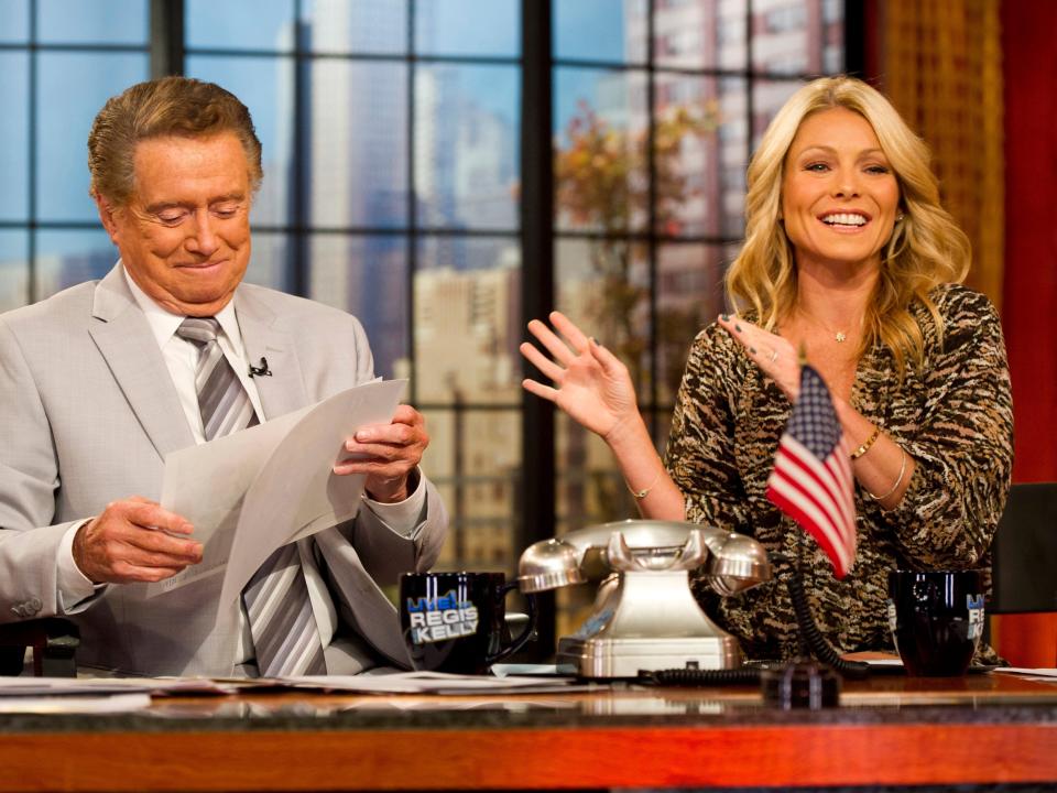 Regis Philbin and Kelly Ripa on the set of "Live With Regis and Kelly" in November 2011.