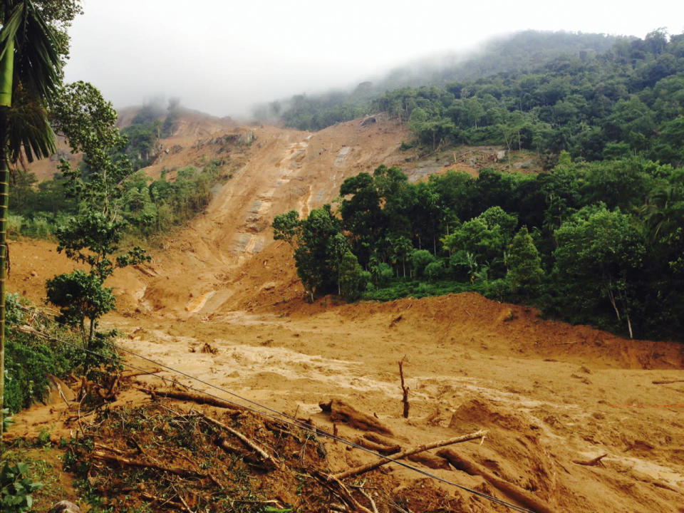 The scene after a massive landslide in Kegalle District, about 45 miles north of Colombo, Sri Lanka, May 18, 2016. (AP Photo/Eranga Jayawardena)