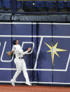 Tampa Bay Rays right fielder Hunter Renfroe looks up as a two-run home run hit by Boston Red Sox's Alex Verdugo clears the fence during the fourth inning of a baseball game Wednesday, Aug. 5, 2020, in St. Petersburg, Fla. (AP Photo/Steve Nesius)