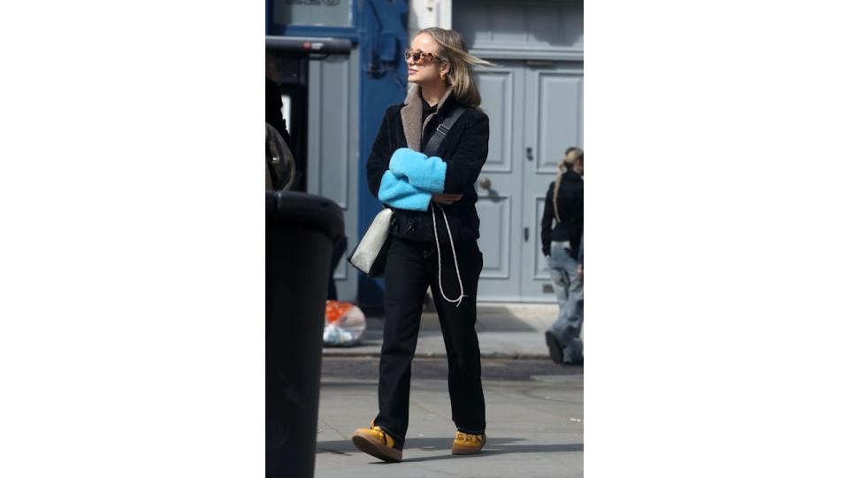 Lady Amelia Windsor walking in black jeans and sunnies