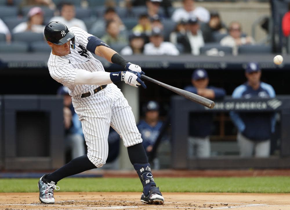 New York Yankees’ Aaron Judge hits a single during the first inning a baseball game against the Tampa Bay Rays on Sunday, Sept. 11, 2022, in New York. (AP Photo/Noah K. Murray)