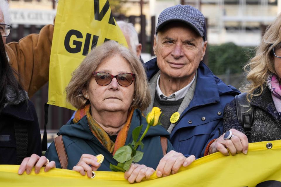 Paola, mother of Giulio Regeni, is flanked by by her husband Claudio prior to the start of the trial for the killing of Cambridge University researcher Giulio Regeni, at the Rome's court, Tuesday, Feb. 20, 2024. Four high-level Egyptian security officials are going on trial in absentia in a Rome court, accused in the 2016 abduction, torture and slaying of an Italian doctoral student in Cairo. (AP Photo/Andrew Medichini)