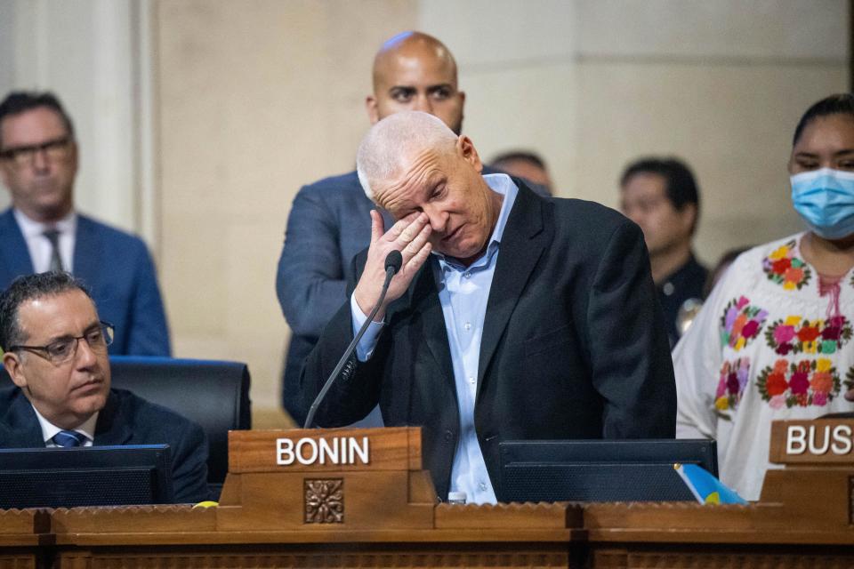 Los Angeles City Councilman Mike Bonin sheds tears as he speaks about the racist comments directed towards his son during the council's meeting on Tuesday, Oct. 11, 2022.