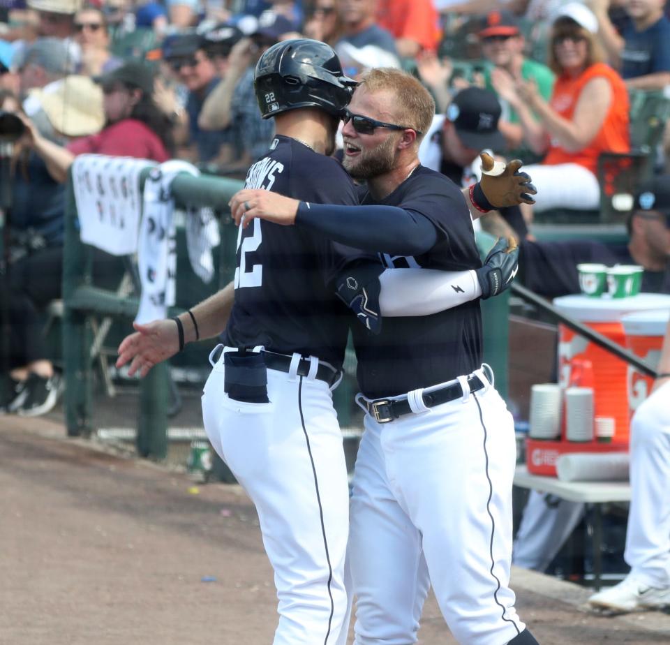 Detroit Tigers center fielder Parker Meadows (22) is met by his brother Austin Meadows after his homer against the Philadelphia Phillies during Grapefruit League action at Publix Field at Joker Marchant Stadium in Lakeland, Florida, on Saturday, Feb. 25, 2023.