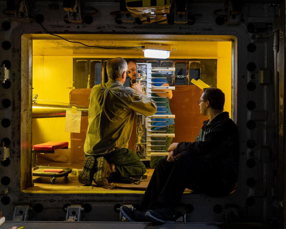 Winner, 'People' category: Technicians are pictured working together to install equipment on the Unitary Plan Wind Tunnel