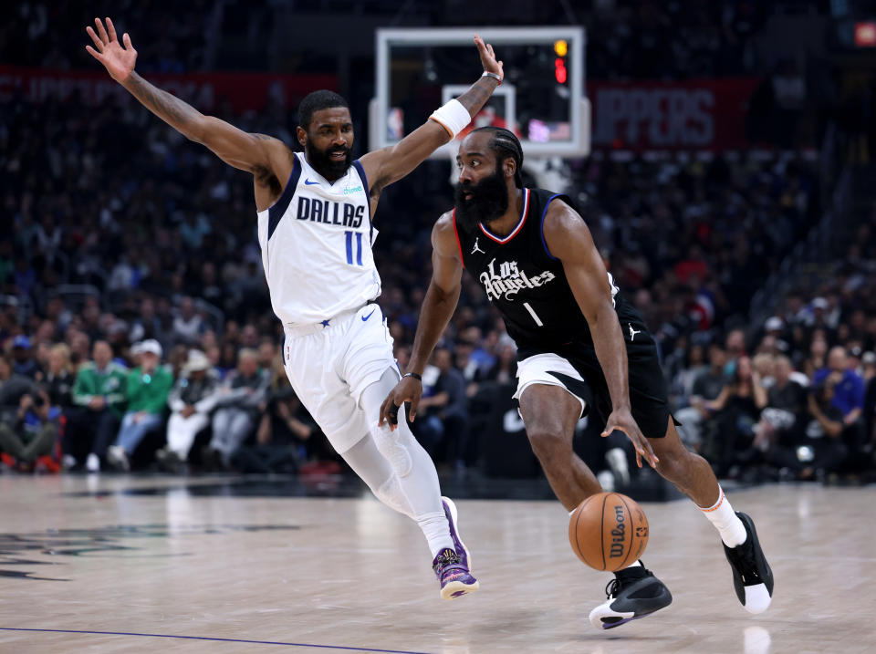 LOS ANGELES, CALIFORNIA - APRIL 23: James Harden #1 of the LA Clippers drives to the basket past Kyrie Irving #11 of the Dallas Mavericks during the first half at Crypto.com Arena on April 23, 2024 in Los Angeles, California. User is consenting to the terms and conditions of the Getty Images License Agreement. (Photo by Harry How/Getty Images)