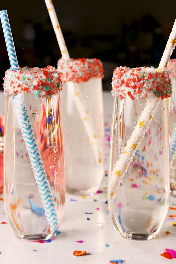 <p>Look at that Pop Rocks rim!</p><p>Get the recipe from <a href="https://www.delish.com/cooking/recipe-ideas/a25622506/confetti-champagne-recipe/" rel="nofollow noopener" target="_blank" data-ylk="slk:Delish;elm:context_link;itc:0;sec:content-canvas" class="link ">Delish</a>. </p>