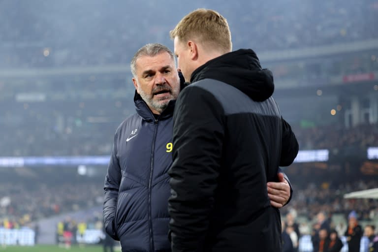 Tottenham manager Ange Postecoglou (left) with <a class="link " href="https://sports.yahoo.com/soccer/teams/newcastle/" data-i13n="sec:content-canvas;subsec:anchor_text;elm:context_link" data-ylk="slk:Newcastle;sec:content-canvas;subsec:anchor_text;elm:context_link;itc:0">Newcastle</a> counterpart Eddie Howe at the Melbourne Cricket Ground (Martin KEEP)