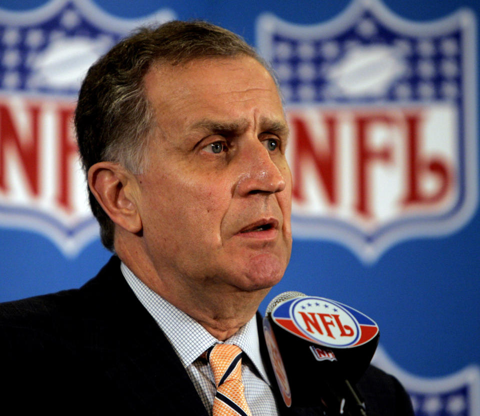 File-This May 23, 2006 file photo shows then NFL Commissioner Paul Tagliabue responding to questions during a news conference at the conclusion of the National Football League's owners spring meeting in Denver. In 2003, the NFL had three minority head coaches: future Pro Football Hall of Famer Tony Dungy, Herman Edwards and Marvin Lewis. In the 12 previous seasons, there had been six. Total. Considering that the majority of the players in the league 16 years ago were minorities, that imbalance was enormous. And disturbing. And, frankly, it was unfair. Tagliabue, then the NFL commissioner, put together a committee that established the "Rooney Rule," which requires all teams with coaching and front office vacancies to interview minority candidates. The rule, long overdue, was named for Dan Rooney, then president of the Pittsburgh Steelers and the overseer of that committee. (AP Photo/Ed Andrieski, File)