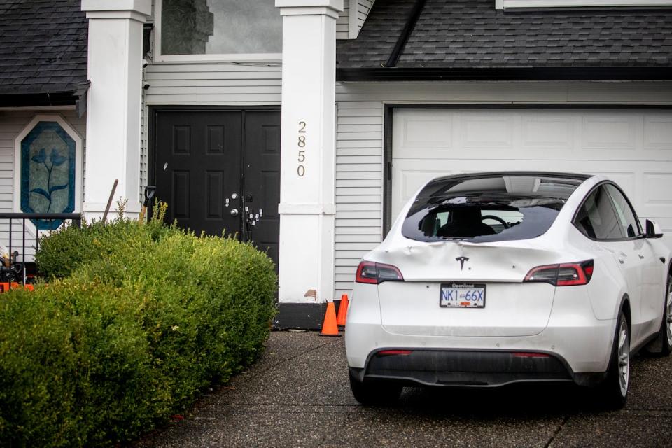 Bullet holes are pictured at a home near 2800-block of154th street in Surrey, British Columbia on Thursday, February 1, 2024. 