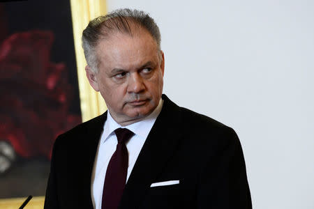 FILE PHOTO: Slovakia's President Andrej Kiska reacts after a meeting of Slovakia’s three top officials at the Bratislava castle, Bratislava, Slovakia March 9, 2018. REUTERS/Radovan Stoklasa