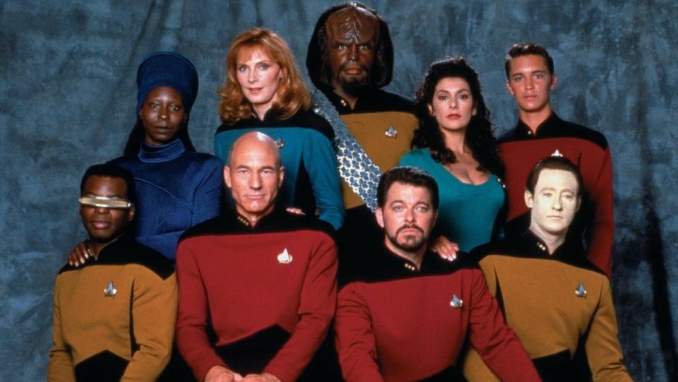 The Star Trek; The Next Generation cast, in their seasons 3-7 uniforms.