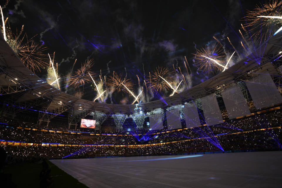 Fireworks go off during the opening ceremony prior the Soccer Club World Cup first round soccer match between Al Ittihad and Auckland City FC at King Abdullah Sports City stadium in Jeddah, Saudi Arabia, Tuesday, Dec. 12, 2023. (AP Photo/Manu Fernandez)