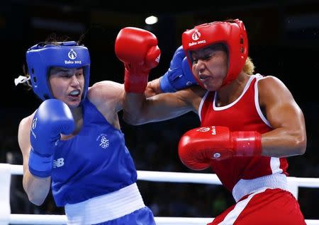 Eselle Mossely of France (R) and Katie Taylor of Ireland fight during their women's 60kg Light weight boxing gold medal fight at the 1st European Games in Baku, Azerbaijan, June 27 , 2015. REUTERS/Kai Pfaffenbach