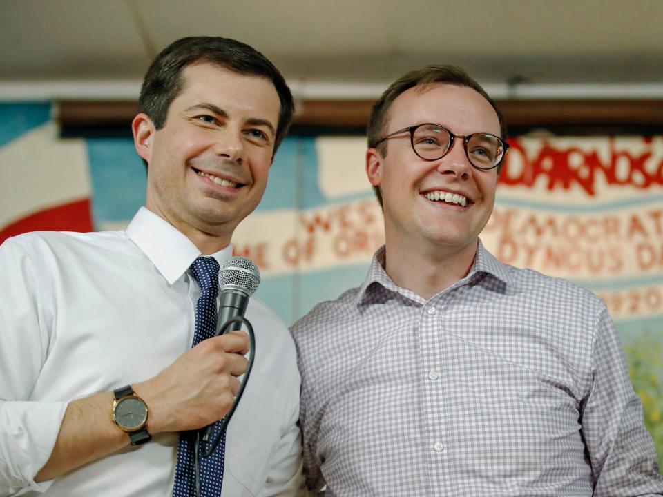 pete buttigieg chasten buttigieg at campaign event holding mic