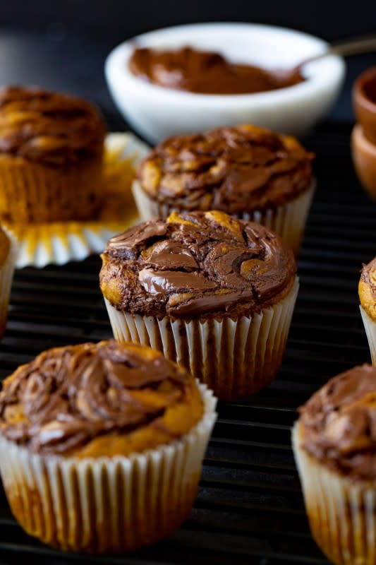 <p>Oh Sweet Basil</p><p>A deliciously soft, fluffy, and totally flavorful muffin is exactly what kids need for a fall breakfast. These Nutella-swirled pumpkin muffins are the best pumpkin muffin ever! </p><p><strong>Get the recipe: <em><a href="https://ohsweetbasil.com/nutella-swirled-pumpkin-muffins-recipe/" rel="nofollow noopener" target="_blank" data-ylk="slk:Nutella-Swirled Pumpkin Muffins;elm:context_link;itc:0;sec:content-canvas" class="link ">Nutella-Swirled Pumpkin Muffins</a></em></strong></p>