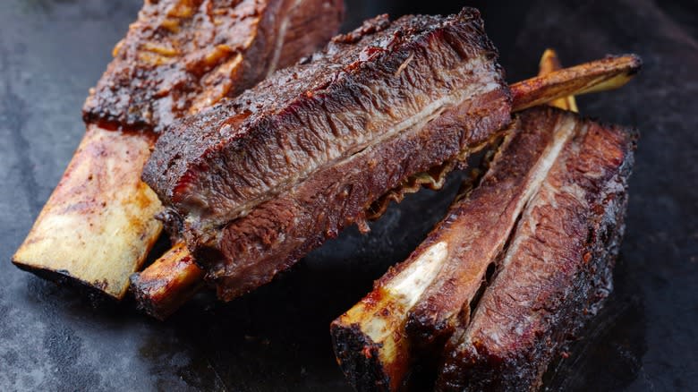 Smoked beef ribs on grill