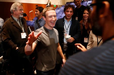 Mark Zuckerberg greets attendees after announcing the Chan Zuckerberg Initiative to "cure, prevent or manage all disease" by the end of the century during a news conference at UCSF Mission Bay in San Francisco, California, U.S. September 21, 2016. REUTERS/Beck Diefenbach