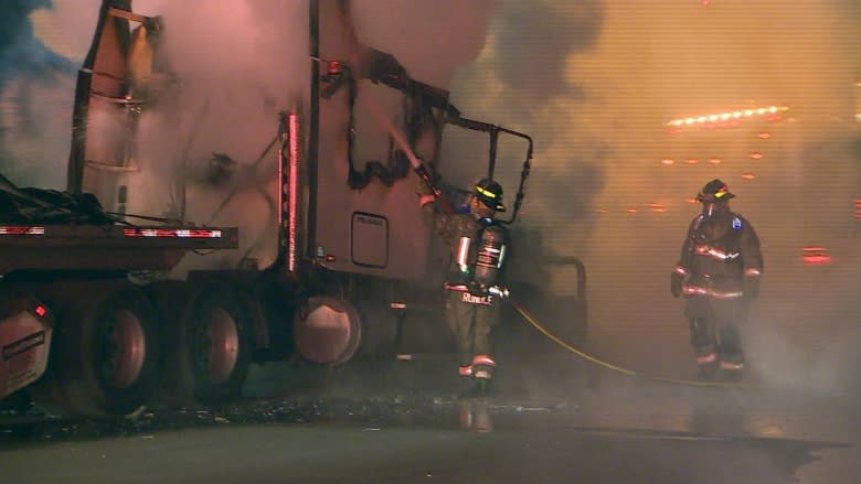 Driver escapes injury after tractor trailer catches fire on Highway 410