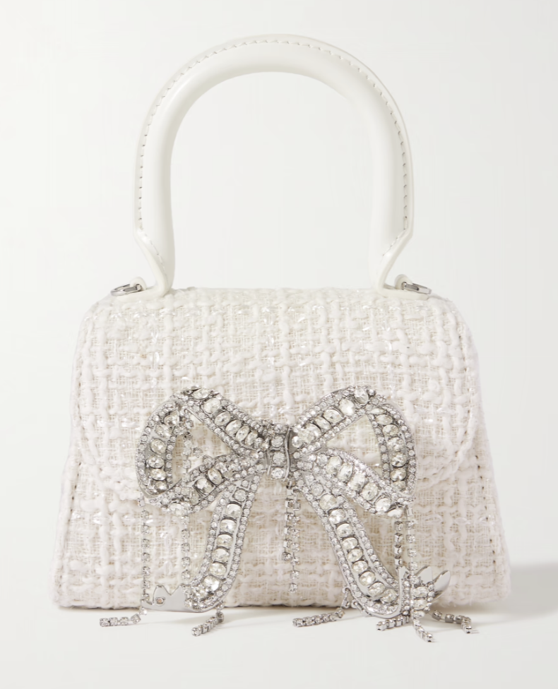 Self-Portrait The Micro Bow mini crystal-embellished bouclé tote. (PHOTO: Net-A-Porter)