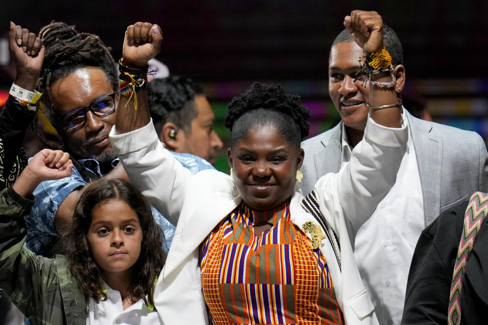 Francia Marquez, the running mate of former rebel Gustavo Petro, celebrates before supporters after they won a runoff presidential election in Bogota, Colombia, Sunday, June 19, 2022. (AP Photo/Fernando Vergara)