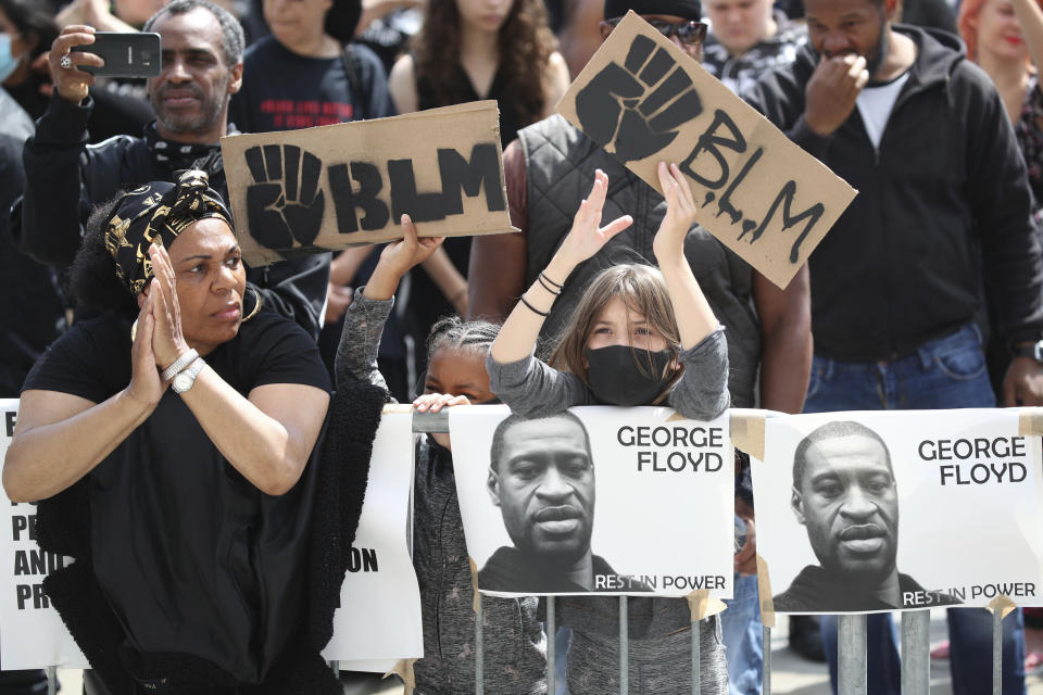 Protesters gather in Leeds, England, Sunday June 14, 2020, during a protest by Black Voices Matter. Global protests are taking place in the wake of George Floyd’s death who was killed on May 25 while in police custody in the US city of Minneapolis. (Danny Lawson/PA via AP)