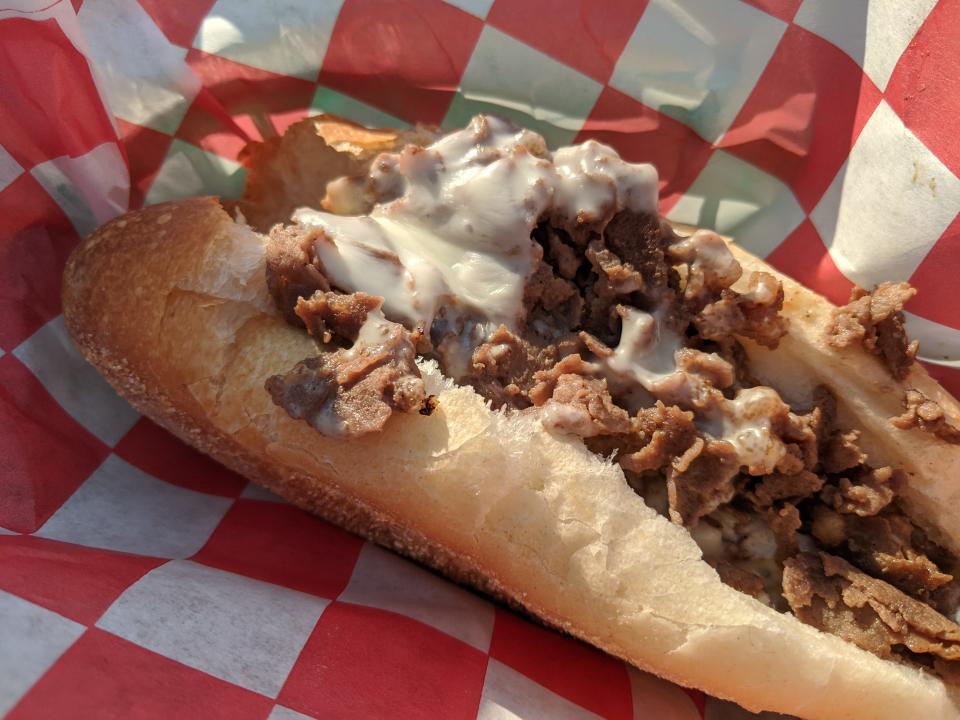 philly cheesesteak sandwich on a roll