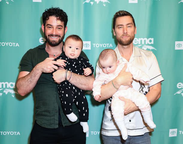 <p>Leon Bennett/Getty </p> Michael Turchin, Lance Bass and their twins in 2022.